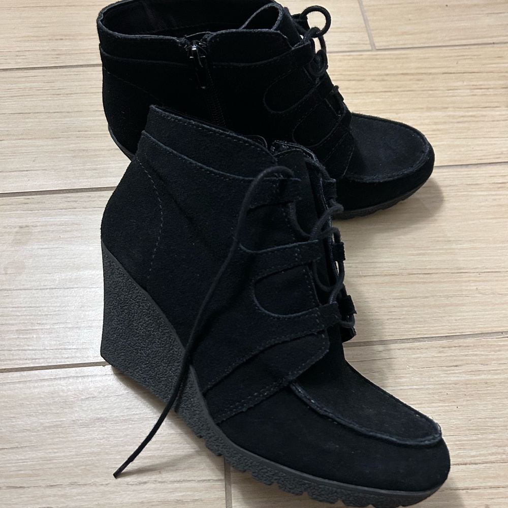 Nine West black tie up booties. Never worn.